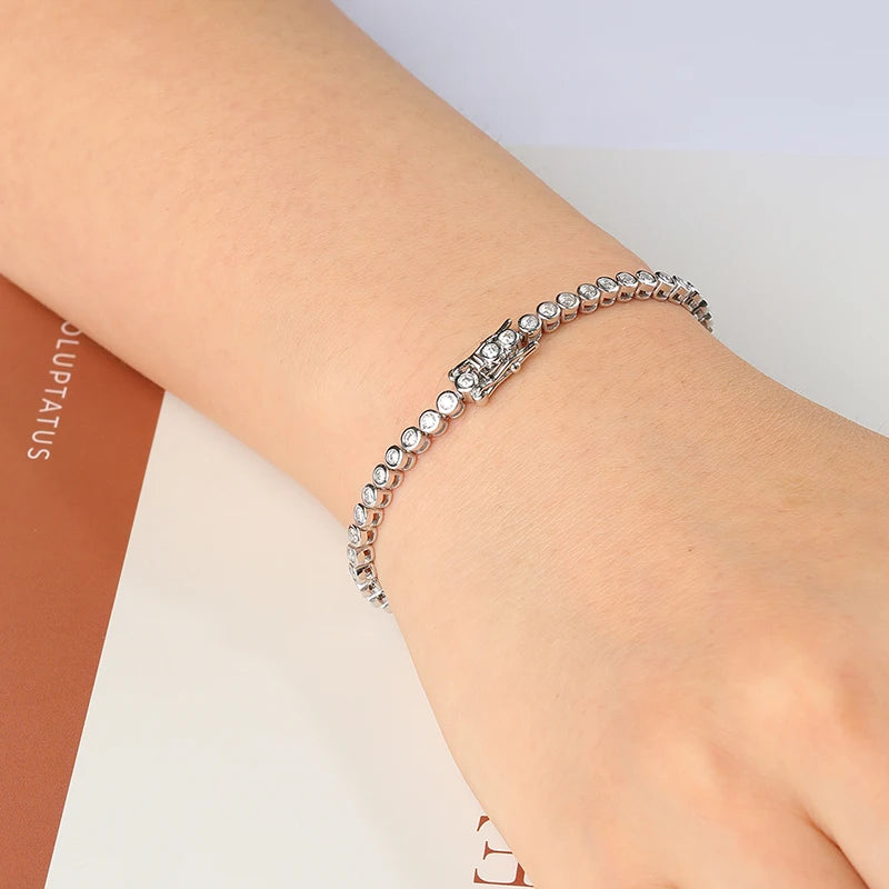Moissanite bracelet on a wrist with a neutral background