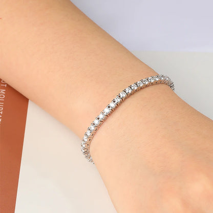 Moissanite bracelet on a person's wrist with a light background